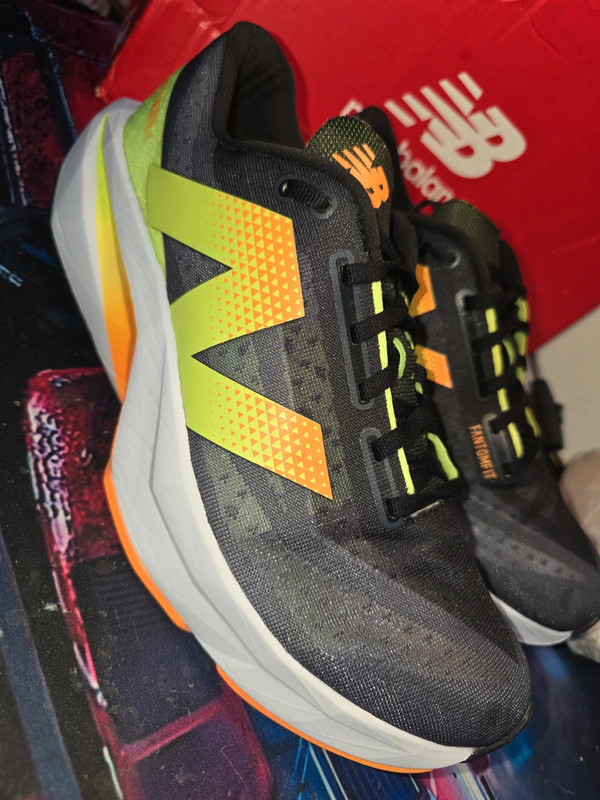 New Balance FuelCell Rebel v4 trainers — authenticated pre-owned, condition RS-8, size UK 9.5